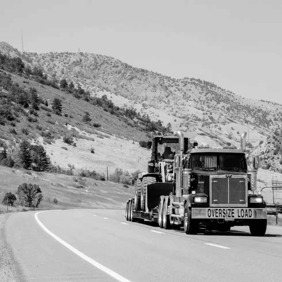 Flatbed Trucking, open deck truck on the highway